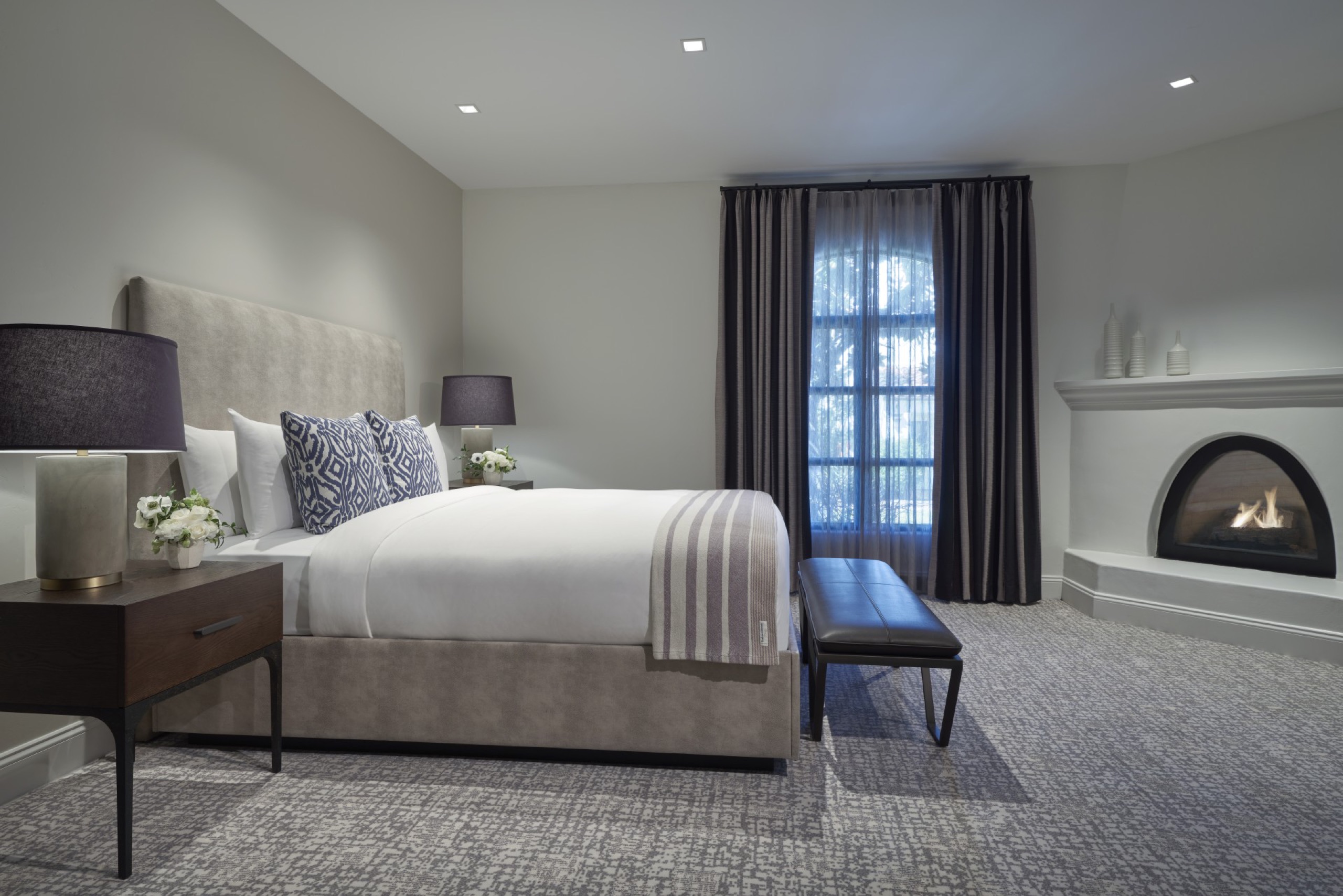 Fireplace Luxury Suite — king bedroom with fireplace