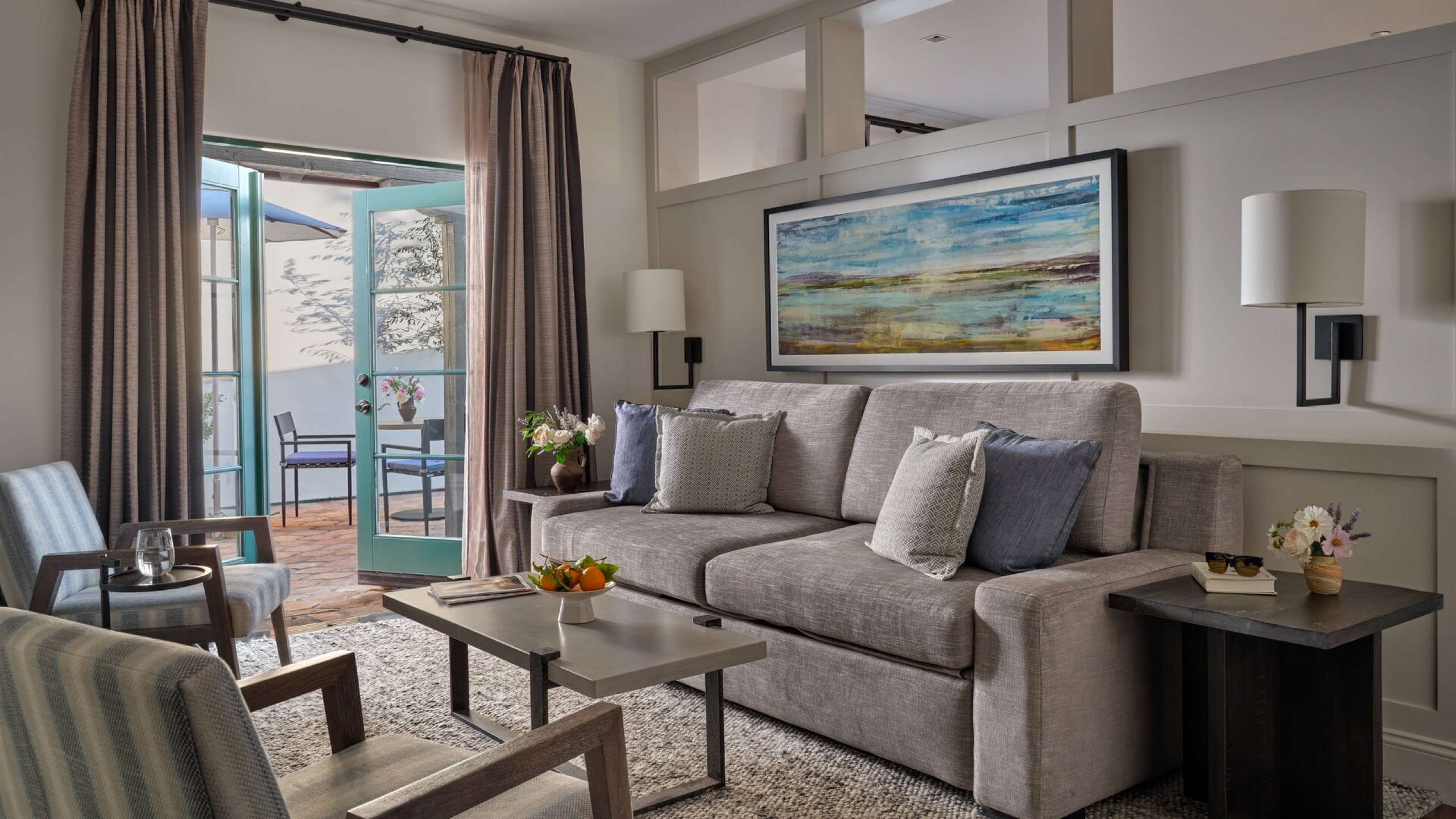 Paseo Villa (1,000 sq ft, rose-garden courtyard) — living room