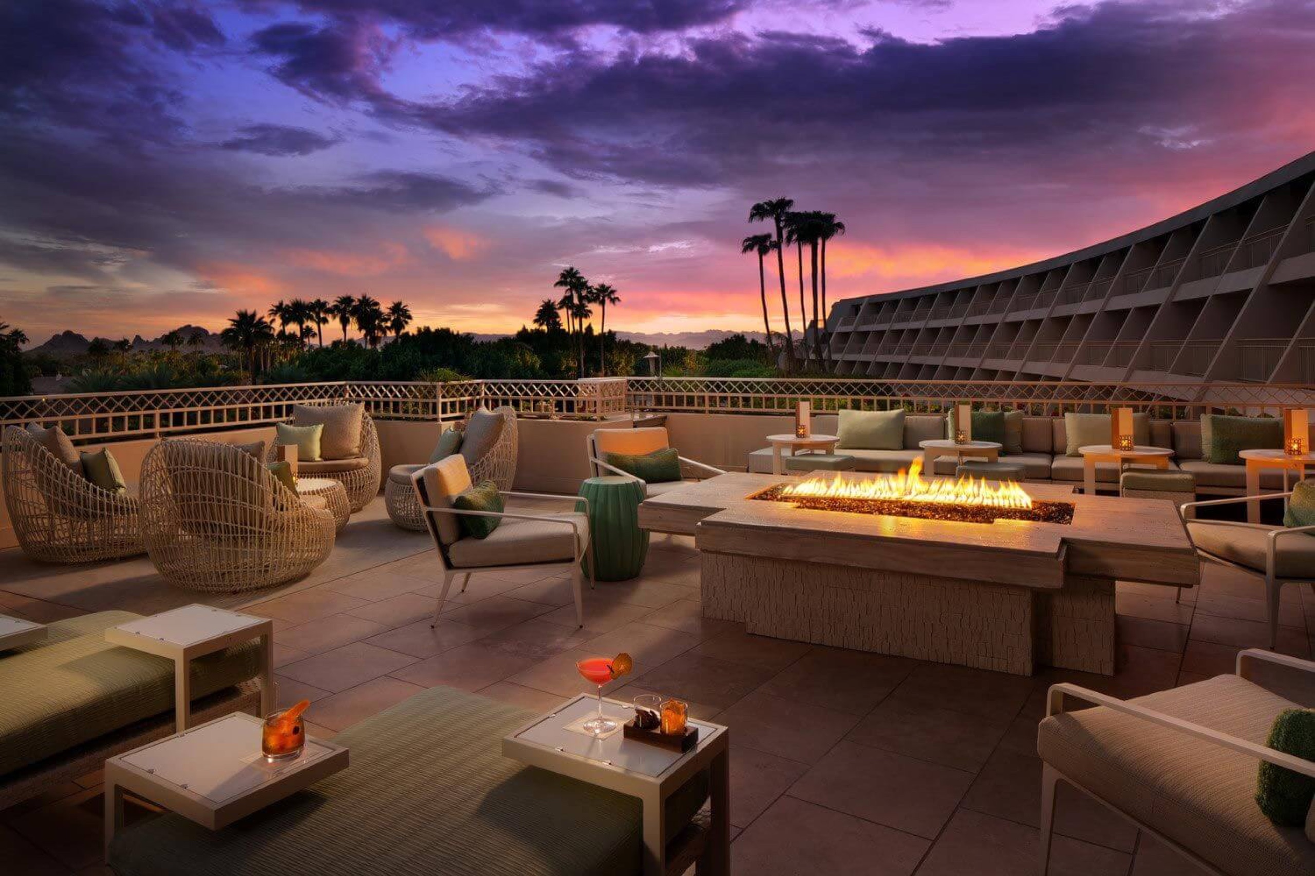 Thirsty Camel terrace at sunset with fire table