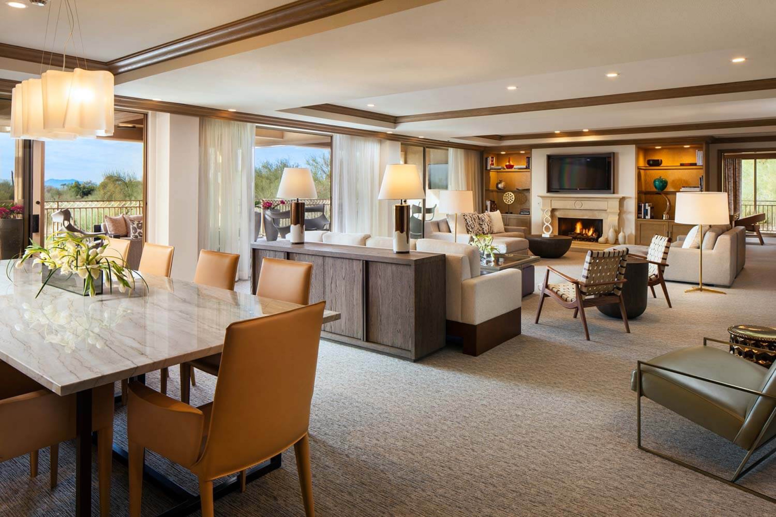Presidential Suite living and dining room with fireplace