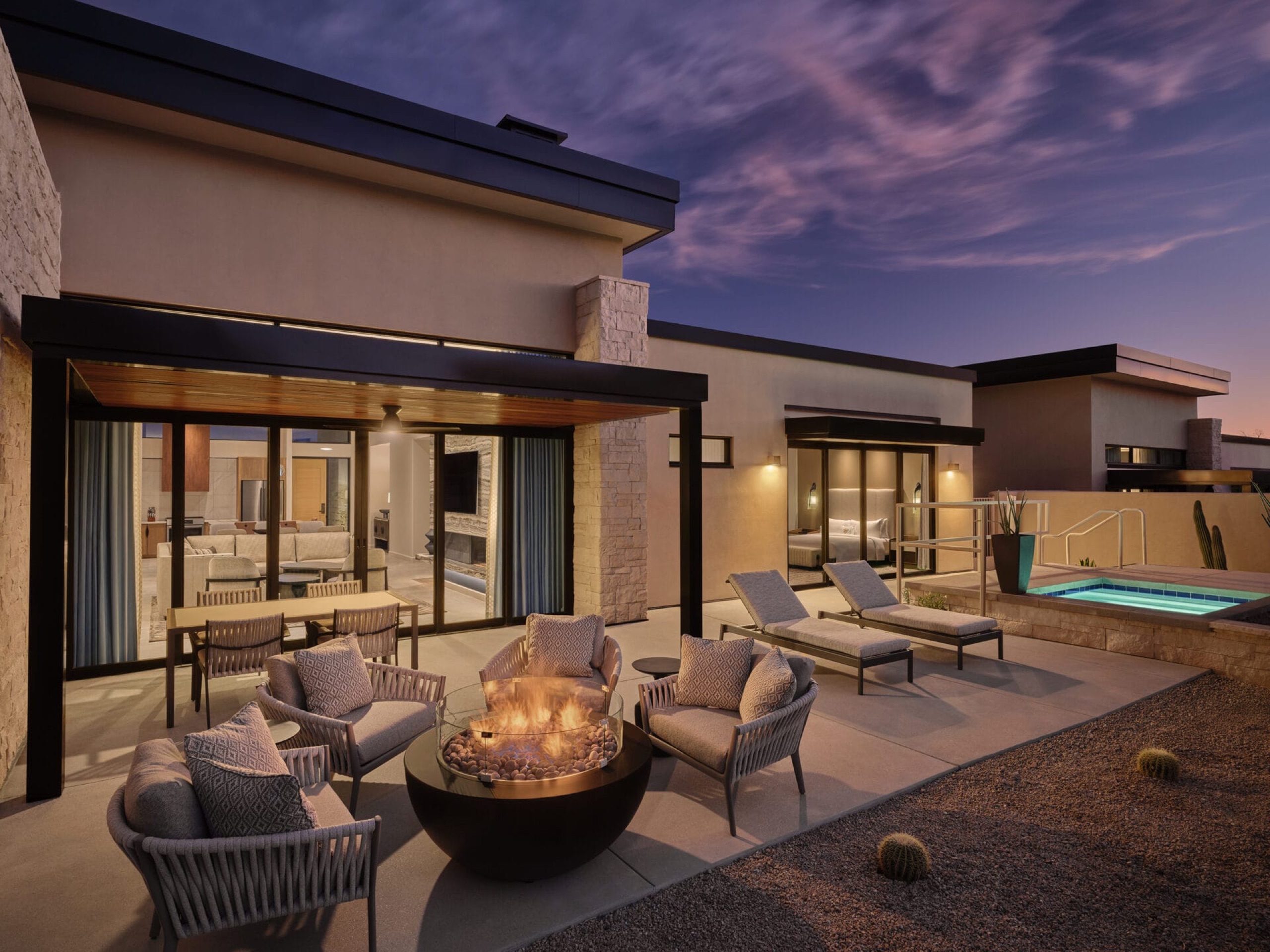 Villa at Canyon Suites — private terrace with plunge pool and fire pit at dusk