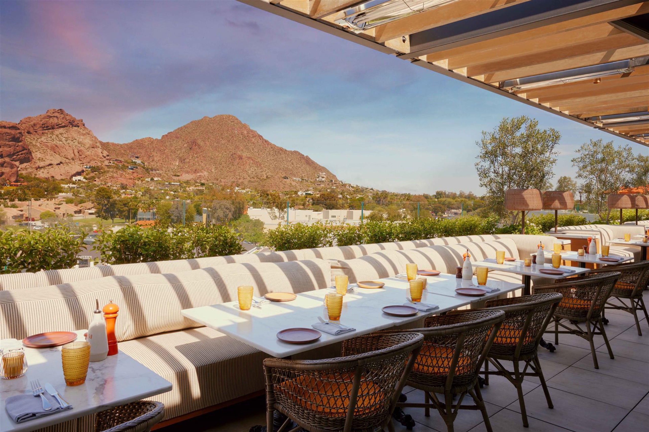 thea rooftop patio at sunrise facing Camelback Mountain