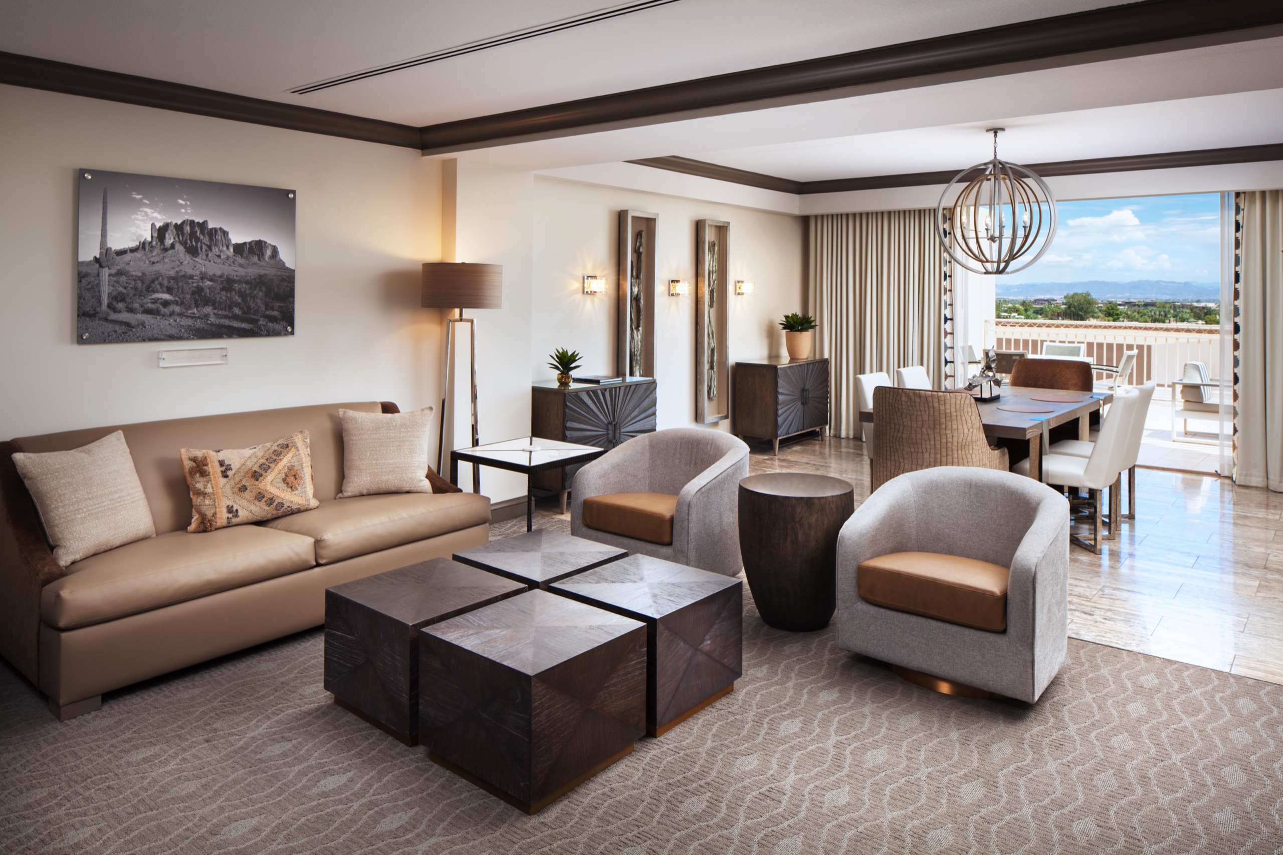 Deluxe One Bedroom Executive Suite living and dining room with terrace