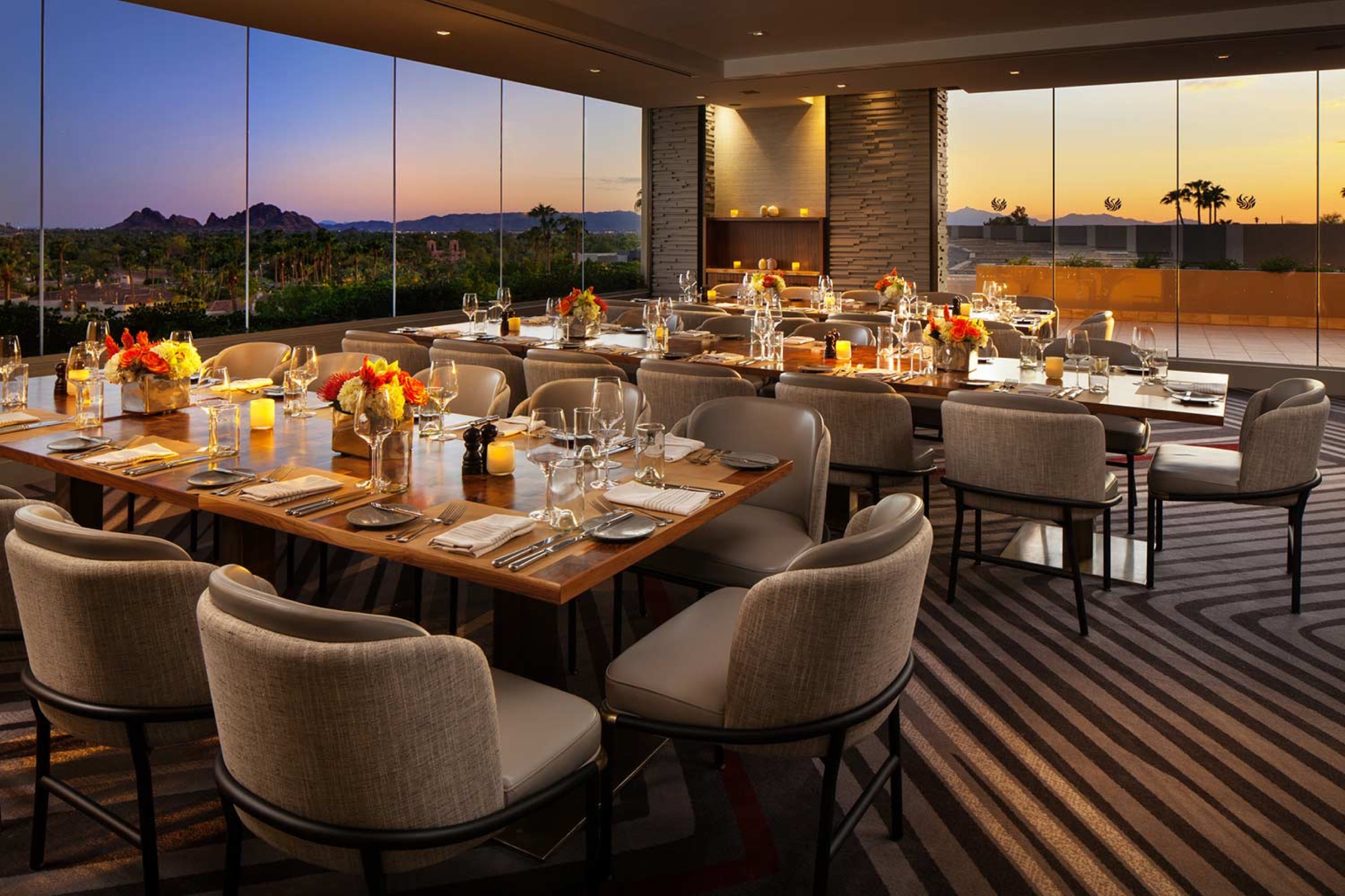 J&G Steakhouse dining room at sunset with Camelback and Papago views