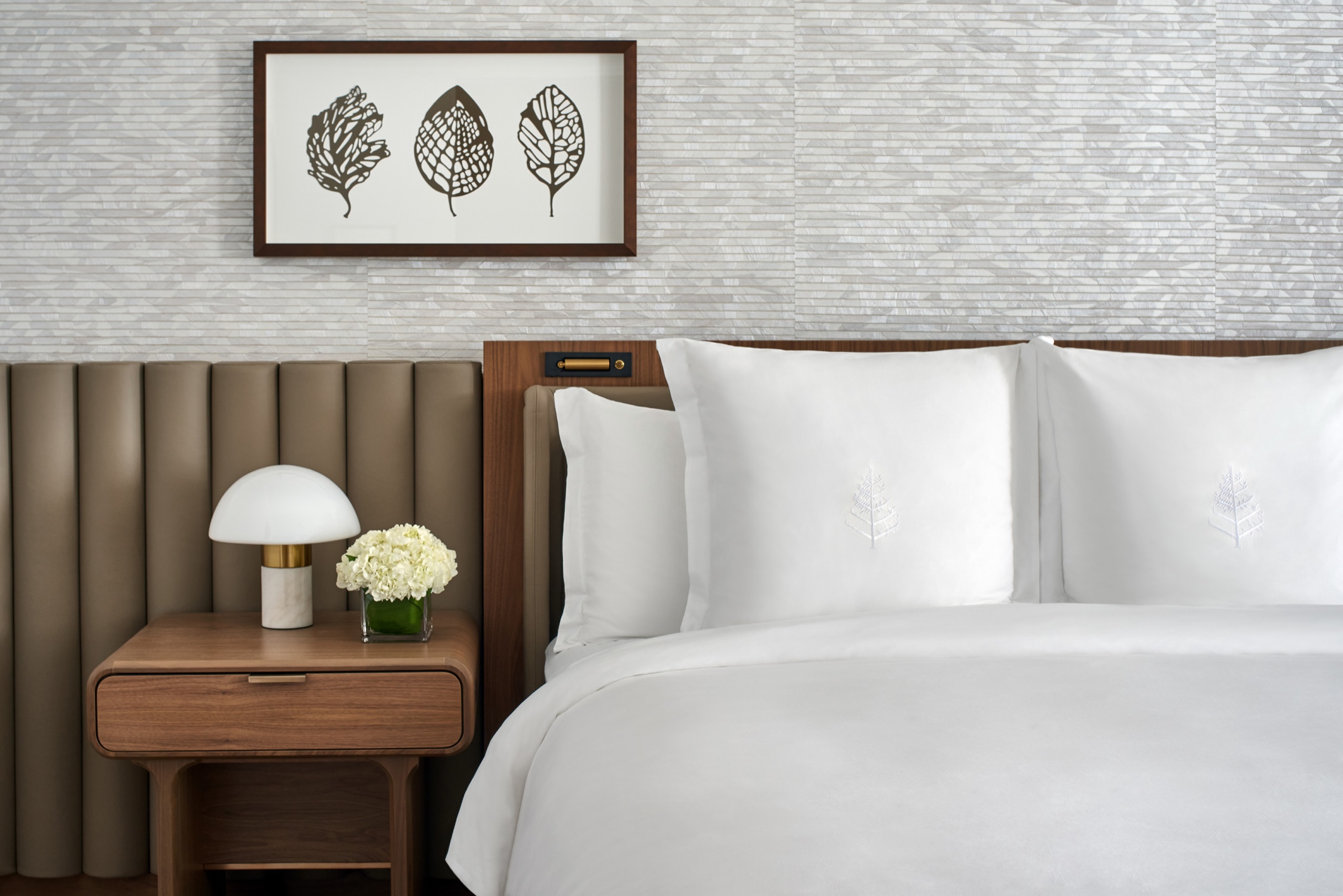 Premier Suite - bedroom opening onto living room (2024 ForrestPerkins renovation)