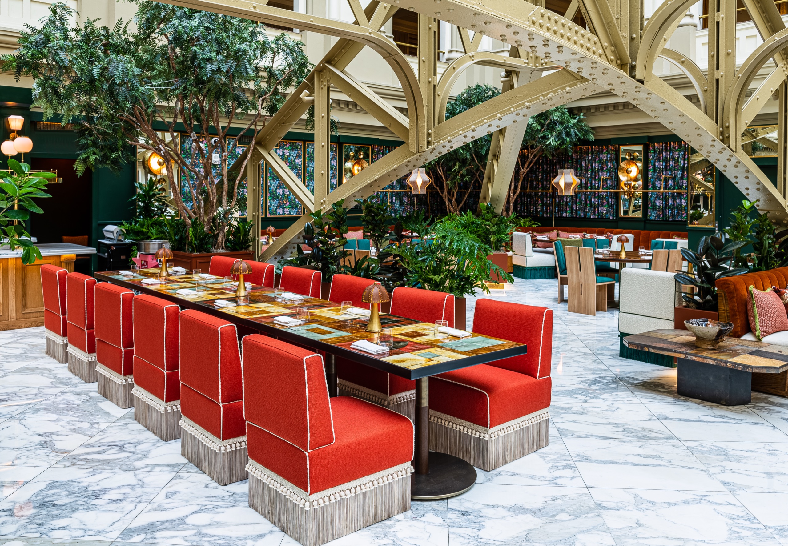 The Bazaar by José Andrés dining room beneath the riveted atrium trusses