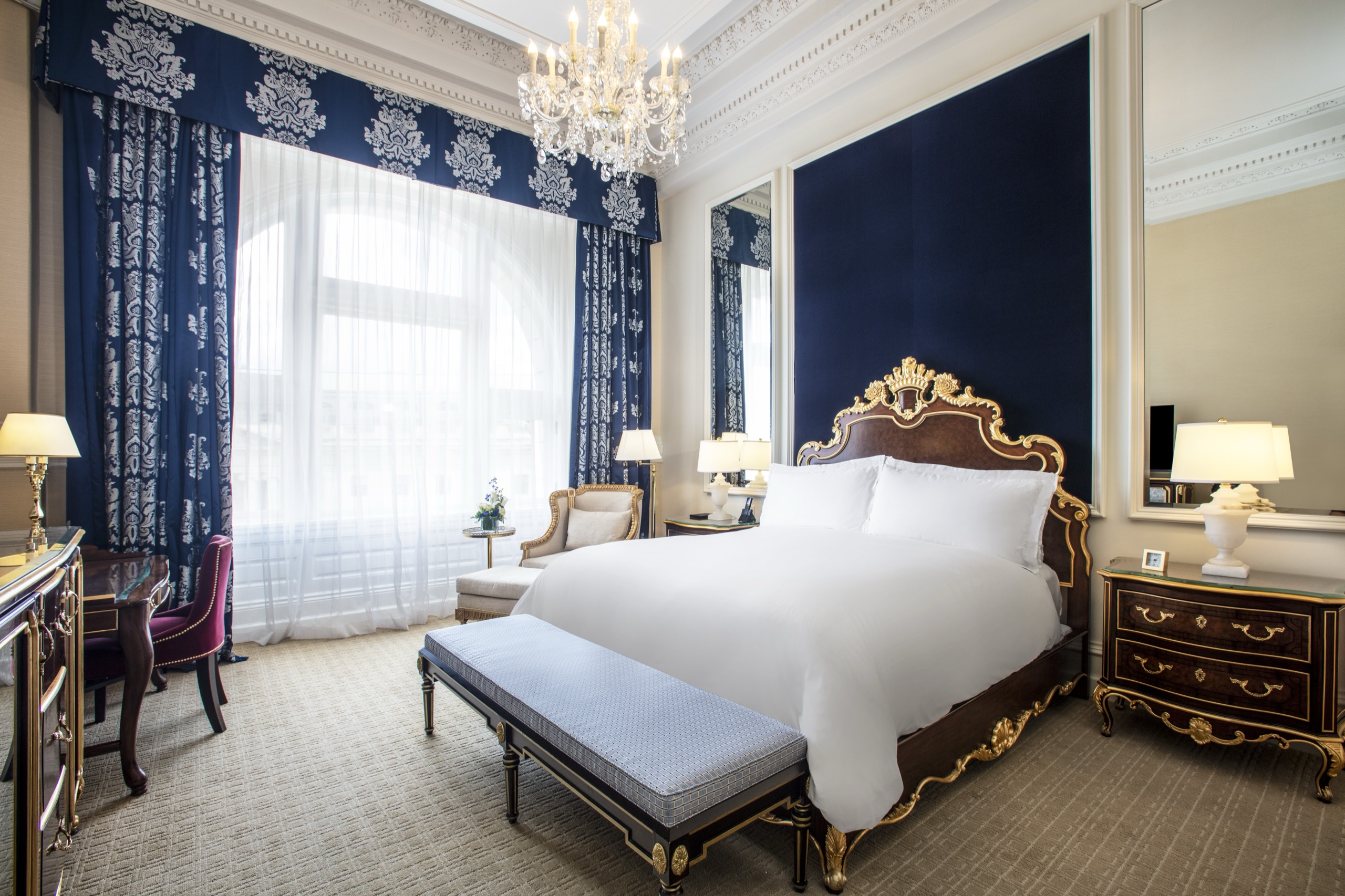 Deluxe King guest room with soaring original windows